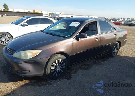 2003 Toyota Camry Le z USA, uszkodzony, nr VIN 4T1BE32KX3U662140